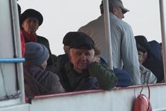 Rusové z Chersonu evakuují obyvatele. Kremelští propagandisté s nimi natáčeli