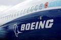 FILE PHOTO: The Boeing logo is seen on the side of a Boeing 737 MAX at the Farnborough International Airshow