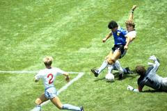 FILE PHOTO: Diego Maradona scores for Argentina