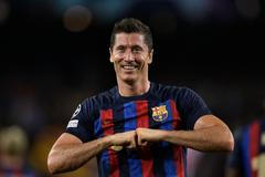 Robert Lewandowski slaví gól v zápase LM Barcelona - Viktoria Plzeň