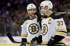David Pastrňák a Patrice Bergeron, Boston Bruins