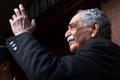 Gabriel Garcia Marquez greets journalists and neighbours on his birthday outside his house in Mexico City