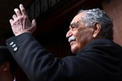Gabriel Garcia Marquez greets journalists and neighbours on his birthday outside his house in Mexico City