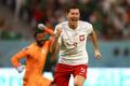 Robert Lewandowski slaví gól v zápase MS 2022 Polsko - Saúdská Arábie