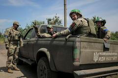 Ukrajinští vojáci v osvobozené vesnici Blahodatne.