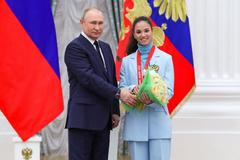 Russian President Vladimir Putin attends a meeting with gold medallists of the 2022 Beijing Olympics in Moscow