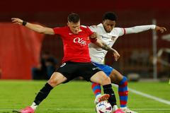 Giovanni González (vlevo) a Alejandro Balde v zápase Mallorky proti Barceloně