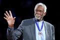 FILE PHOTO: Celtics' legend Russell stands with his Presidential Medal of Freedom during the NBA All-Star basketball game in Los Angeles