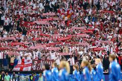 Fanoušci Gruzie mířící na zápas Gruzie proti Turecku