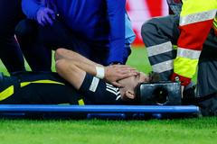 Zraněný Kieran Tierney v zápase Eura 2024 Skotsko - Švýcarsko