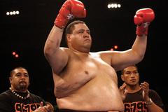FILE PHOTO: Akebono gestures before fighting at K-1 World Grand Prix in Honolulu.