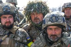 Ukrajinští vojáci říkají, že budou bojovat až do konce, „s Amerikou nebo bez ní“