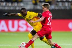 Michal Sadílek (v červením) v akci