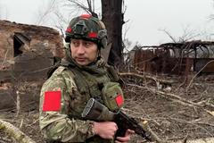 "Bude to smrtelně nebezpečné pro Rusko, když budeme dál bojovat," řekl ruský bloger Kalašnikov