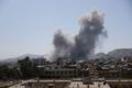 Smoke rises after strikes on Syria's defense ministry in Damascus
