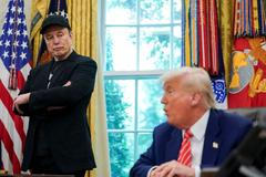 FILE PHOTO: U.S. President Donald Trump and Elon Musk attend a press conference at the White House