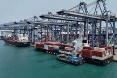 FILE PHOTO: A drone view shows containers at the terminals at the port in Kwai Chung in Hong Kong