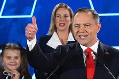 Vítěz prezidentských voleb Karol Nawrocki s manželkou Martou Nawrockou