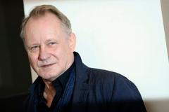 Cast member Stellan Skarsgard poses during the photo call for the movie "Nymphomaniac: Vol. II" at the 71st Venice Film Festival
