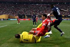 Jamal Musiala a Gianluigi Donnarumma