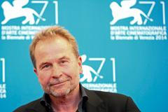 Director Ulrich Seidl poses during the photocall for the movie "Im Keller" at the 71st Venice Film Festival