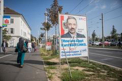 Volby v Rakousku obrazem. Jméno Kurz je na každém rohu, místo migrace se řeší klima