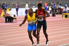 Braima Suncar Dabo a Jonathan Busby na konci závodu na 5000 m, MS v atletice 2019