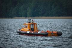 Dobrovolní záchranáři na jezeru Kisajno.