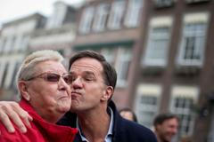 polibek Mark Rutte premiér volička Nizozemsko volební kampaň 2017