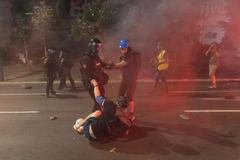Clashes between police and anti-government protesters in Belgrade