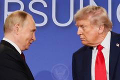 FILE PHOTO: U.S. President Trump meets with Russian President Putin in Alaska