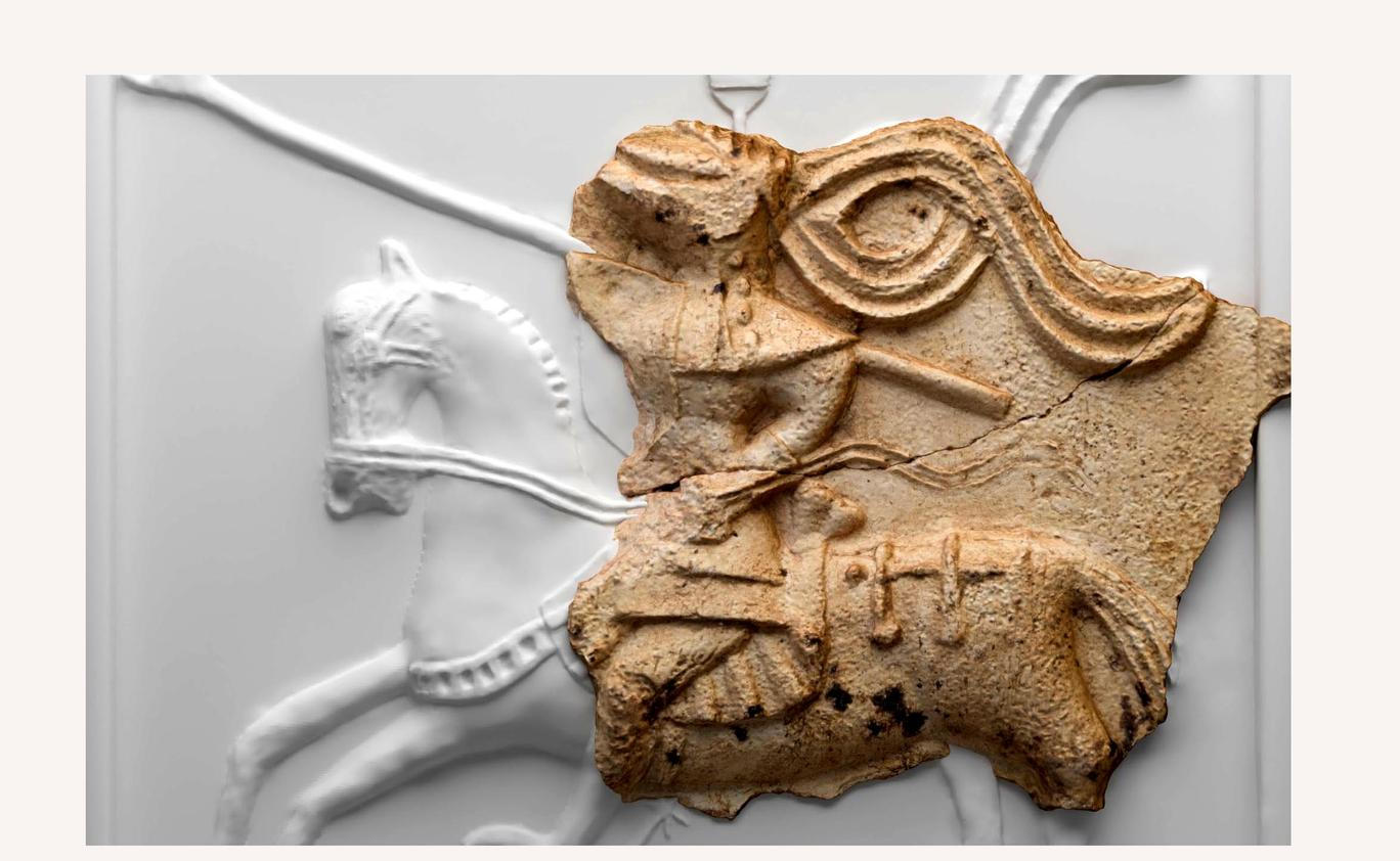 	
Rekonstrukce kachle podle nalezeného střepu.