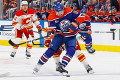NHL: Calgary Flames at Edmonton Oilers hokej David Tomášek