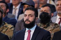 FILE PHOTO: FILE PHOTO: Syria’s interim President Ahmed al-Sharaa attends the “Aleppo, Key to Victory” celebration in Aleppo