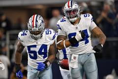 Dallas Cowboys (Marshawn Kneeland vpravo)
