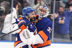 Kyle Palmieri a David Rittich