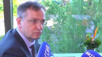 Ruská delegace před jednáním s Ukrajinou