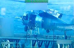 U.S. forces abseil onto an oil tanker during its seizure by the United States off the coast of Venezuela