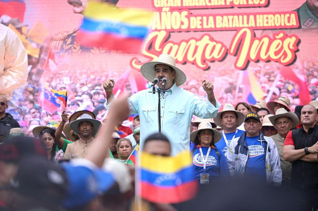 Government supporters march to commemorate the Battle of Santa Ines, in Caracas