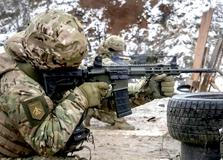 Ukrainian servicemen attend a military exercise between combat missions, in Kharkiv region