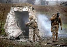 Ukrainian servicemen attend a military exercise between combat missions in Kharkiv region