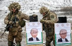 Ukrainian servicemen attend a military exercise between combat missions, in Kharkiv region