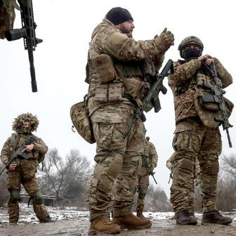 Ukrainian servicemen attend a military exercise between combat missions, in Kharkiv region