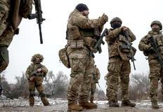 Ukrainian servicemen attend a military exercise between combat missions, in Kharkiv region