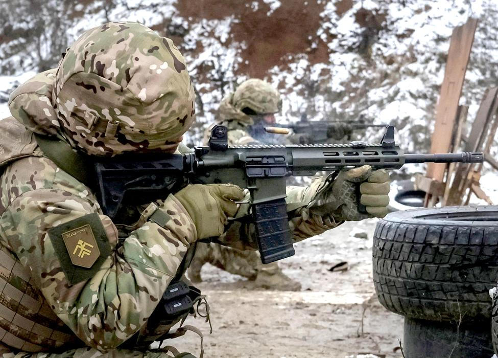 Ukrainian servicemen attend a military exercise between combat missions, in Kharkiv region