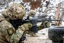 Ukrainian servicemen attend a military exercise between combat missions, in Kharkiv region