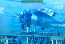 U.S. forces abseil onto an oil tanker during its seizure by the United States off the coast of Venezuela