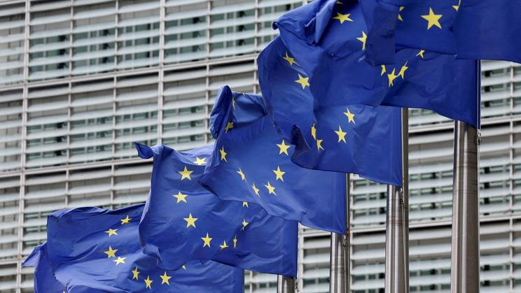 FILE PHOTO: FILE PHOTO: European Union flags flutter outside the EU Commission headquarters in Brussels