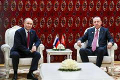 Russian President Vladimir Putin meets with Turkish President Tayyip Erdogan in Ashgabat