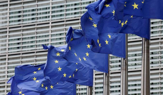 FILE PHOTO: FILE PHOTO: European Union flags flutter outside the EU Commission headquarters in Brussels